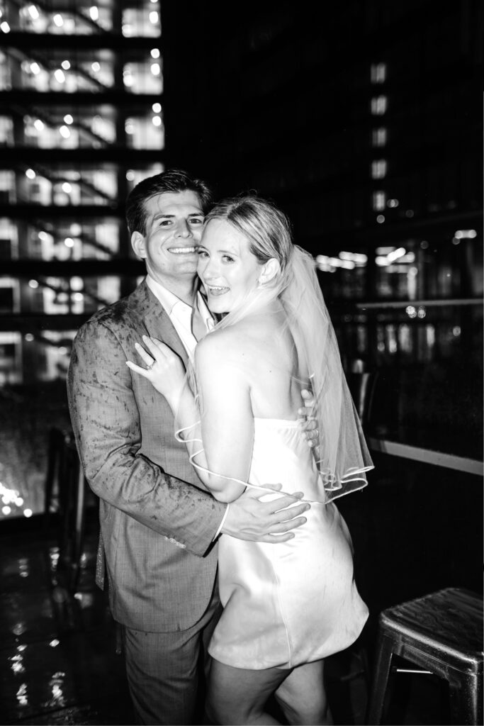 bride & groom at night after their wedding reception at Gulph Mills Golf Club