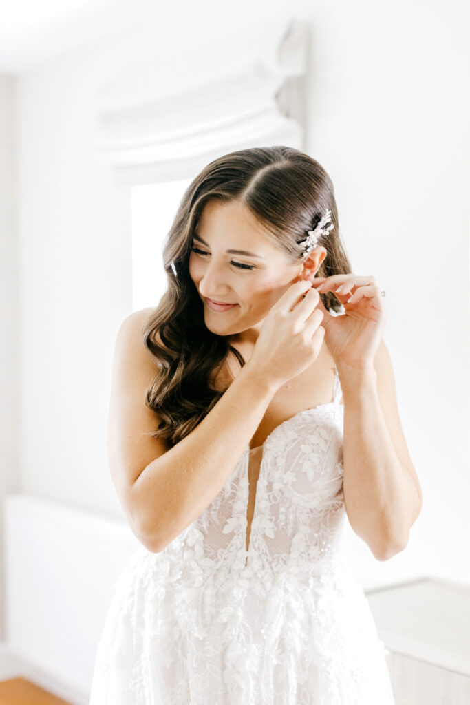 bride getting ready for her summer Vermont wedding day by Emily Wren Photography