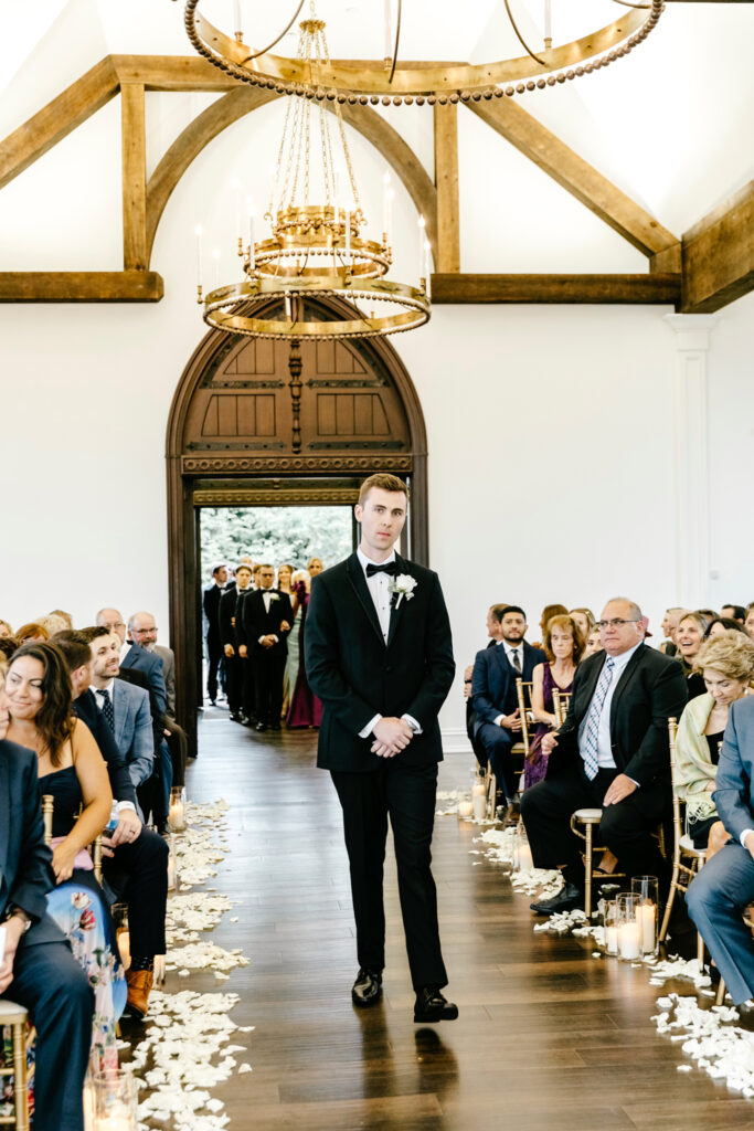 groom walking down the aisle at Park Savoy chapel