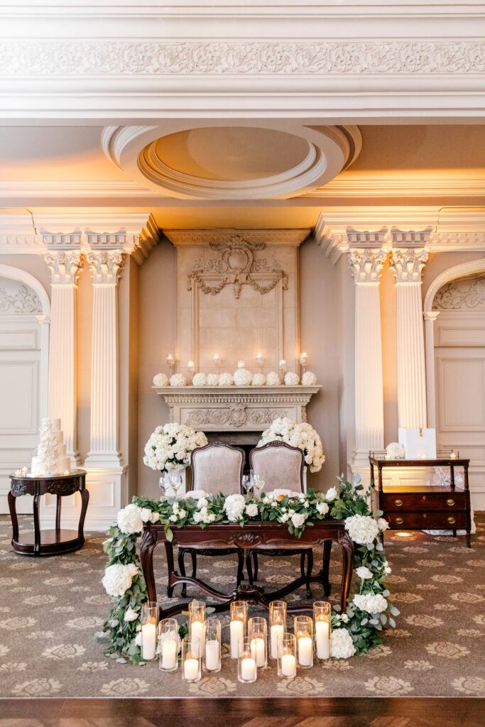 sweetheart table at all white wedding reception at New Jersey estate venue