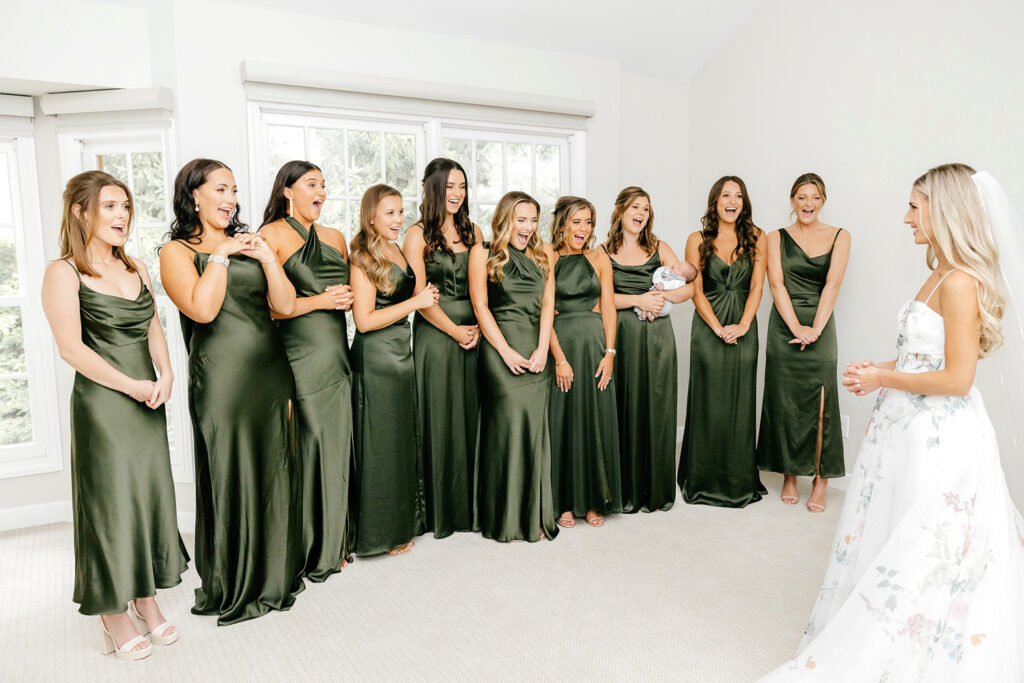 first look with bridesmaids by Emily Wren Photography