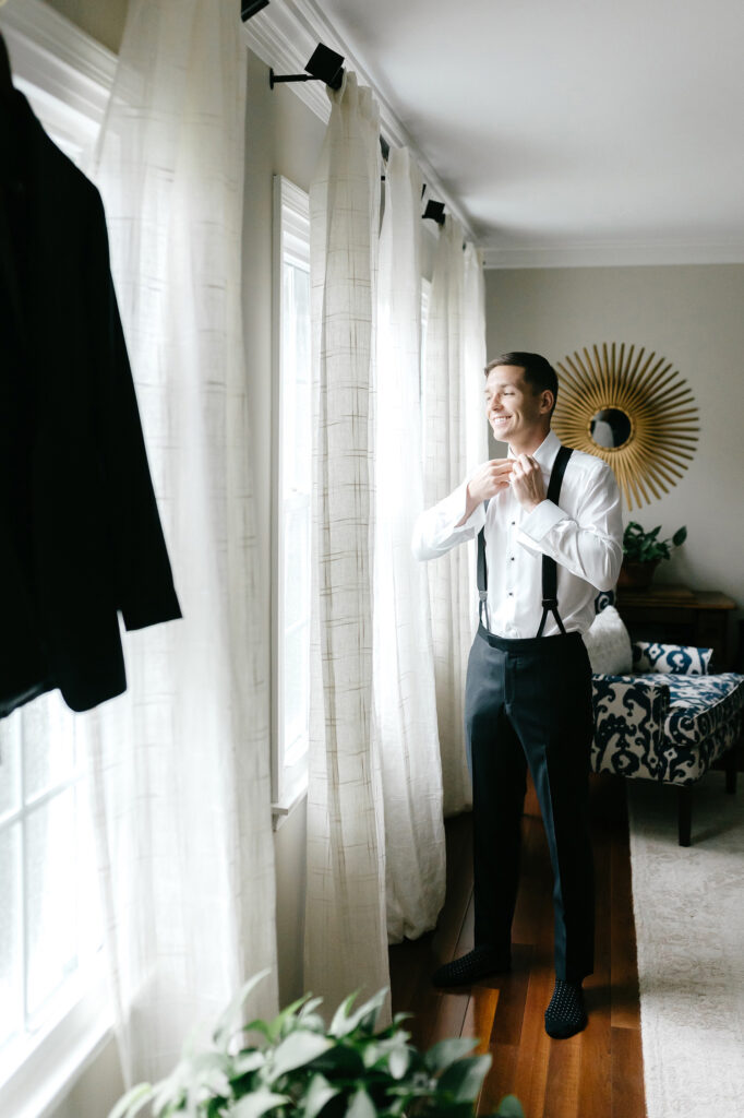 groom getting ready for his late summer Pennsylvania wedding