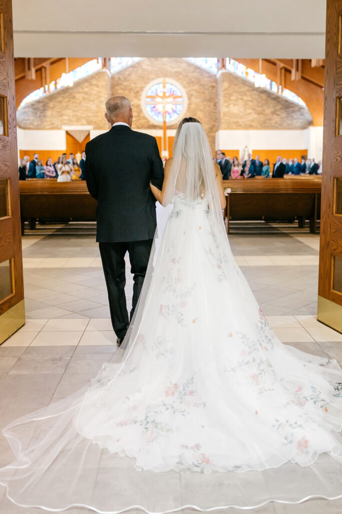 bride entering her Pennsylvania church wedding ceremony at Saint Elizabeth's Parish