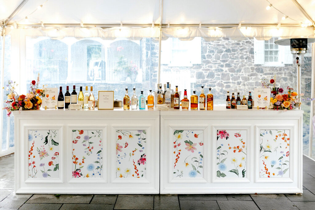 Custom bar for floral-themed wedding reception by Emily Wren Photography