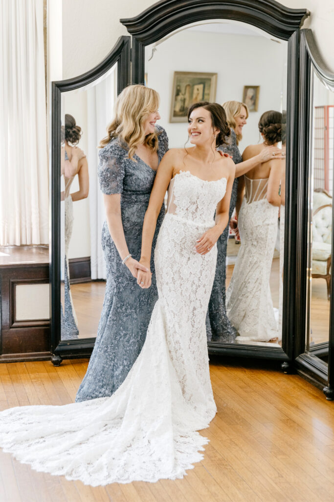 bride getting ready for her elegant Pennsylvania wedding with her mother