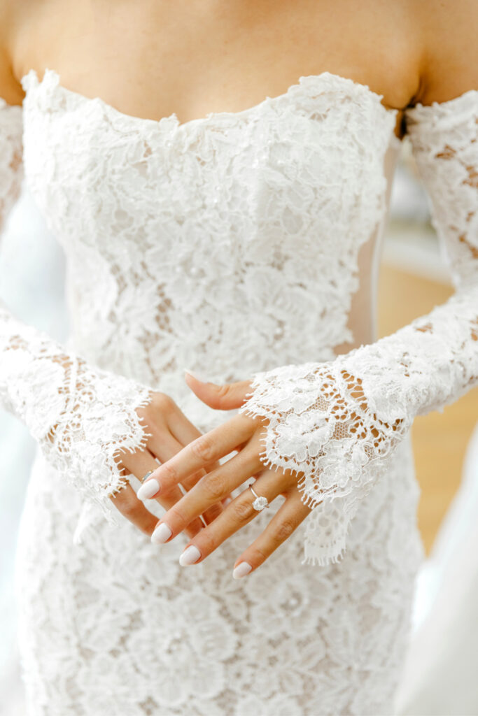 white lace sleeves on Julie Vino bridal gown