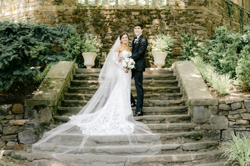 Elegant and timeless wedding portrait of bride and groom outside Parque Ridley Creek.