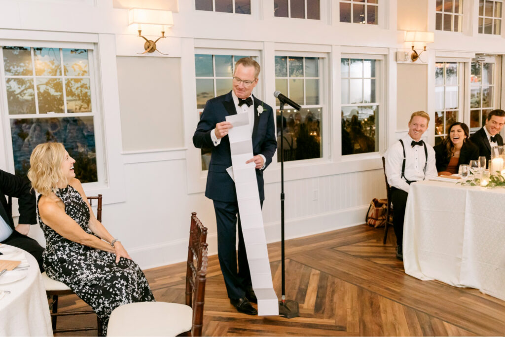 funny father of the bride wedding reception speech with long scroll by Emily Wren Photography