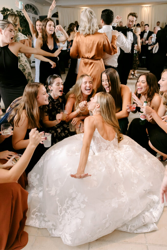 bride dancing and having fun with her best friends at Maryland wedding reception