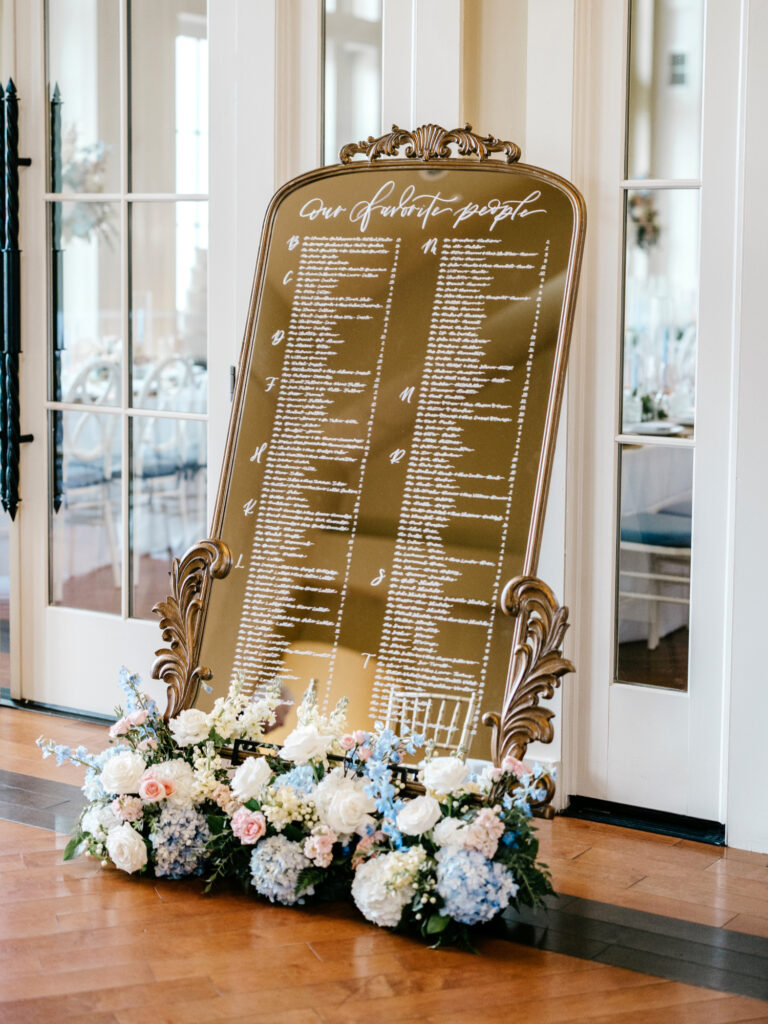 gold mirror wedding reception seating chart by the 1127 Series Creative