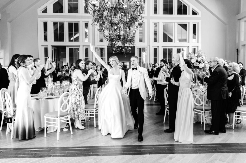 bride & grooms wedding reception entrance at The Ryland Inn