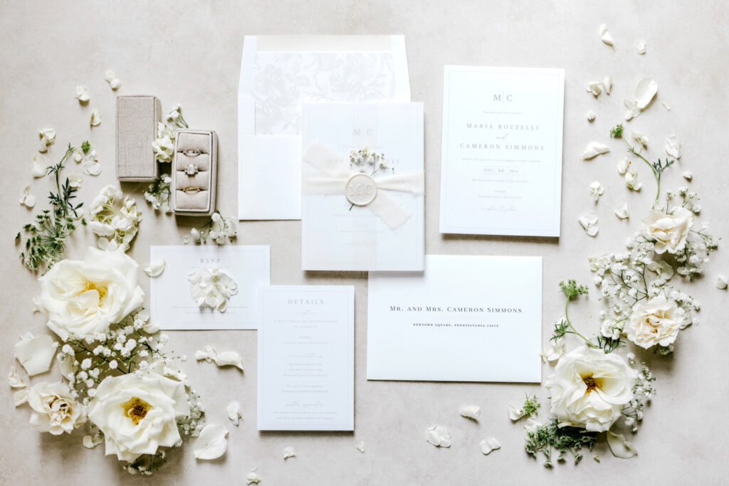 all white sophisticated wedding invitation suite by Emily Wren Photography