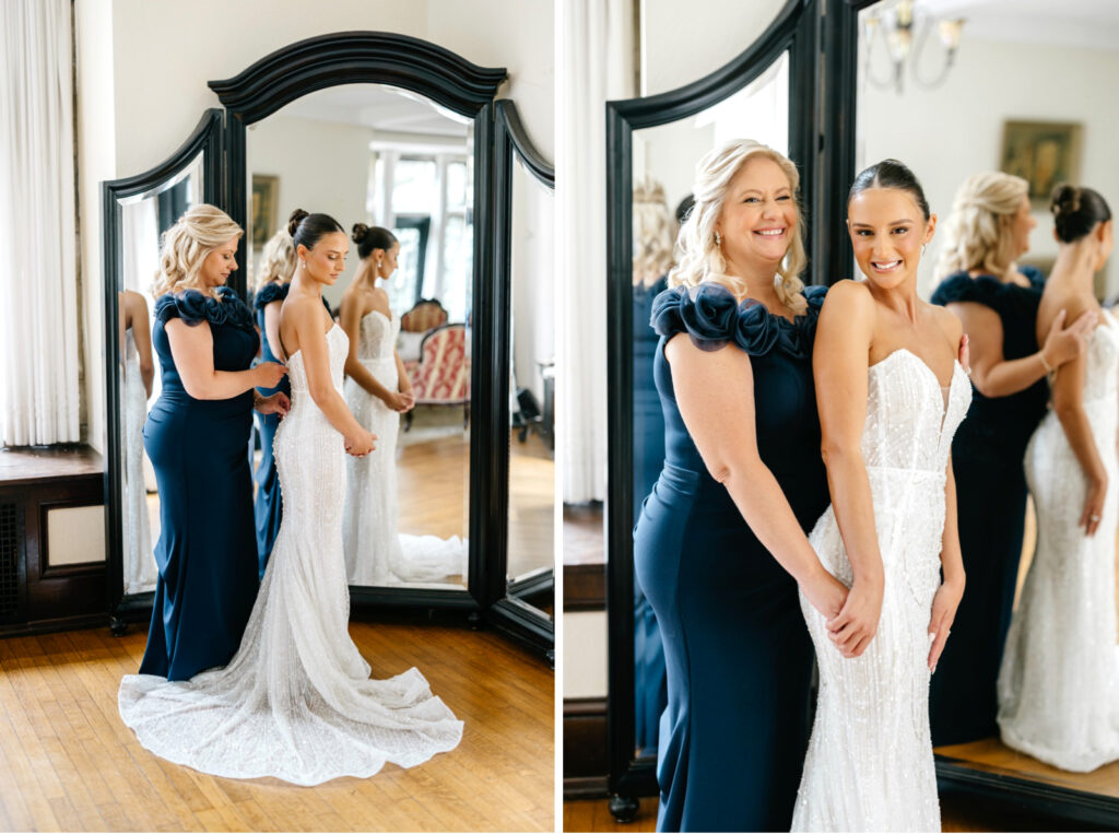 bride getting dressed with the help of her mother for her summer wedding in Pennsylvania by Emily Wren Photography