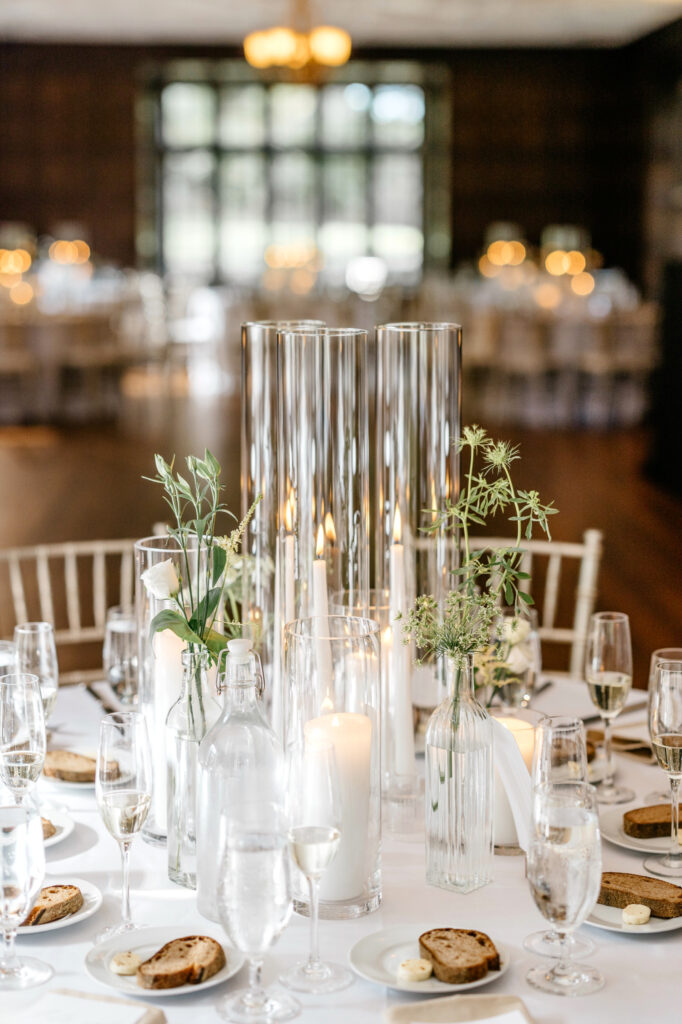 white candles & simple greenery wedding reception table decor by Emily Wren Photography