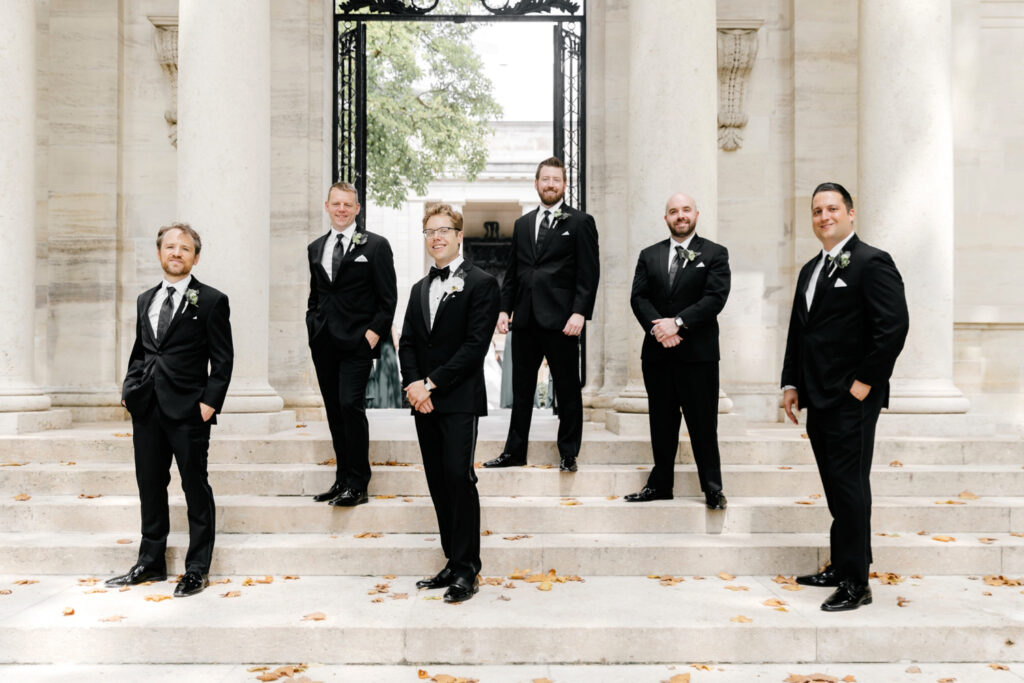 groom with groomsmen at the Rodin Museum on summer wedding day