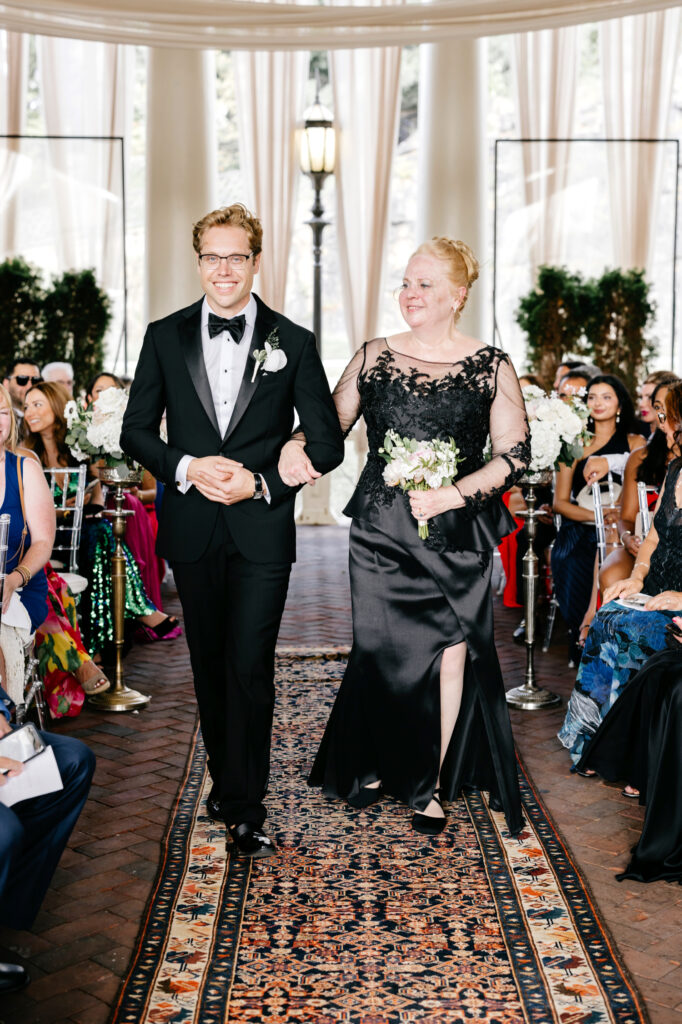 groom walking down the aisle with his mother at Philadelphia Water Works