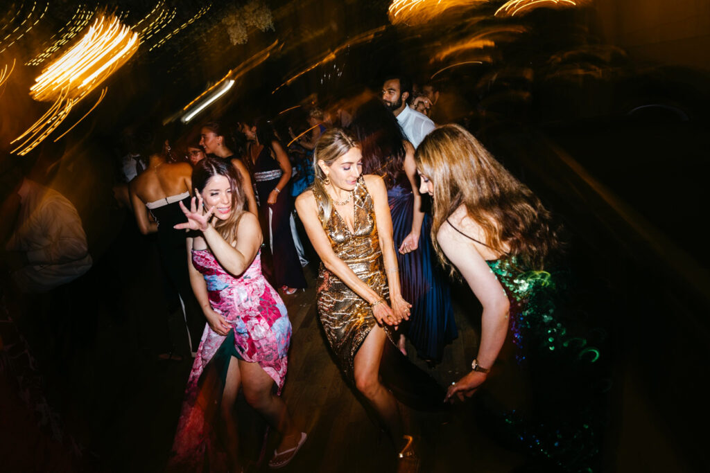 guests dancing at Cescaphe wedding reception by Emily Wren Photography