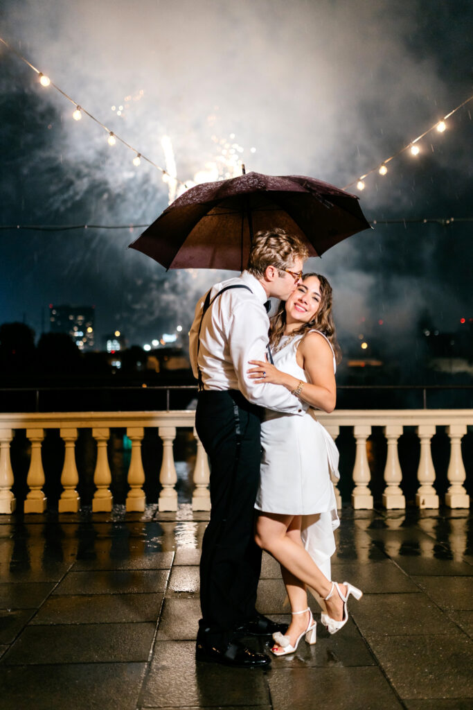 bride & groom watching their firework show at their Philadelphia Water Works reception