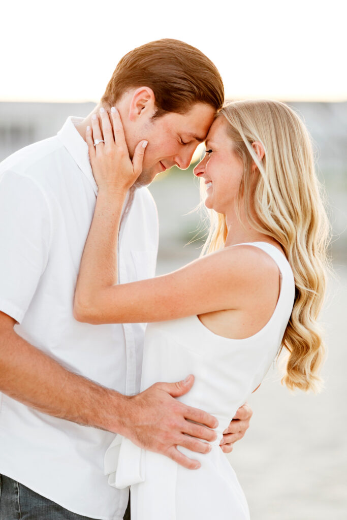 romantic engagement portraits on the beach in Spring Lake New Jersey by Emily Wren Photography