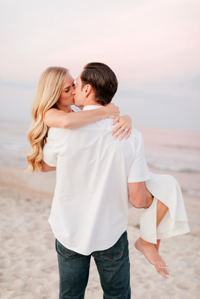 romantic New Jersey beach engagement photoshoot during beautiful pink sunset by Emily Wren Photography