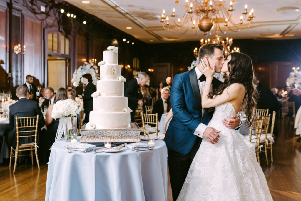 bride & groom during their cake cutting at their Union League of Philadelphia wedding reception