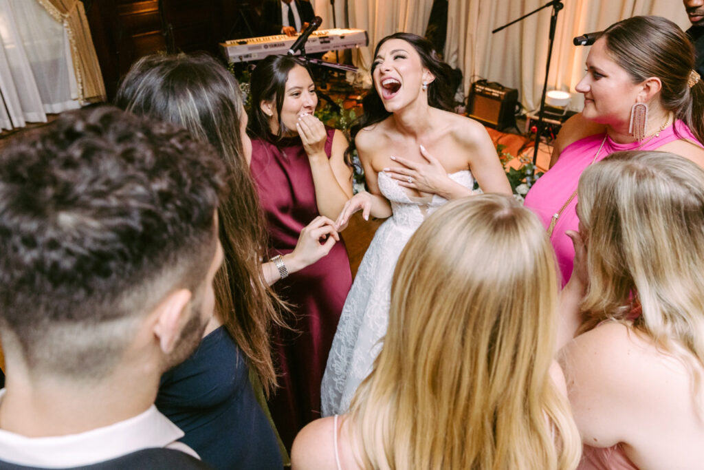 bride singing and having fun at her Center City Philadelphia wedding reception