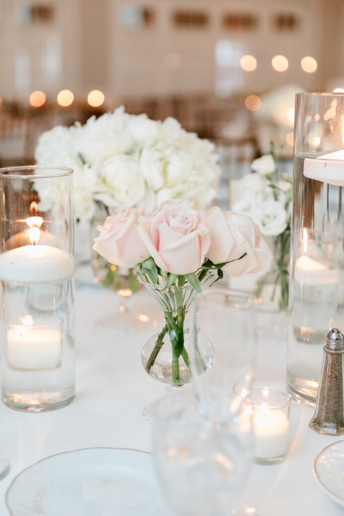 white & pink floral table decor for wedding reception by Emily Wren Photography