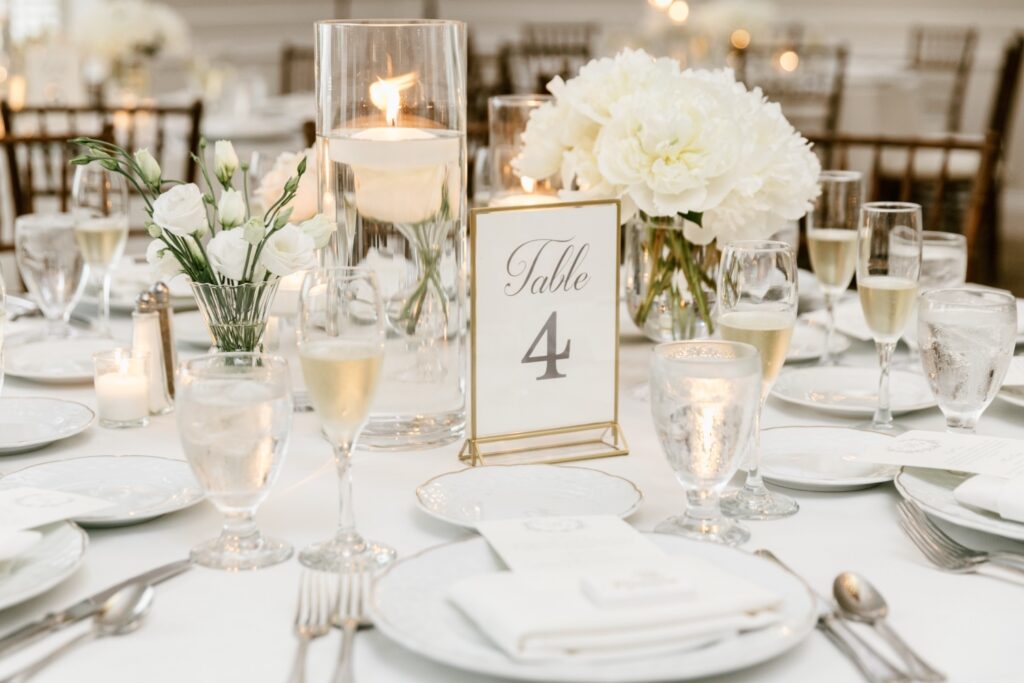 all white elegant wedding reception tablescape by Emily Wren Photography