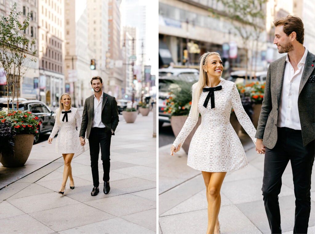 Couple walking through Center City Philadelphia during their engagement photos by Emily Wren Photography