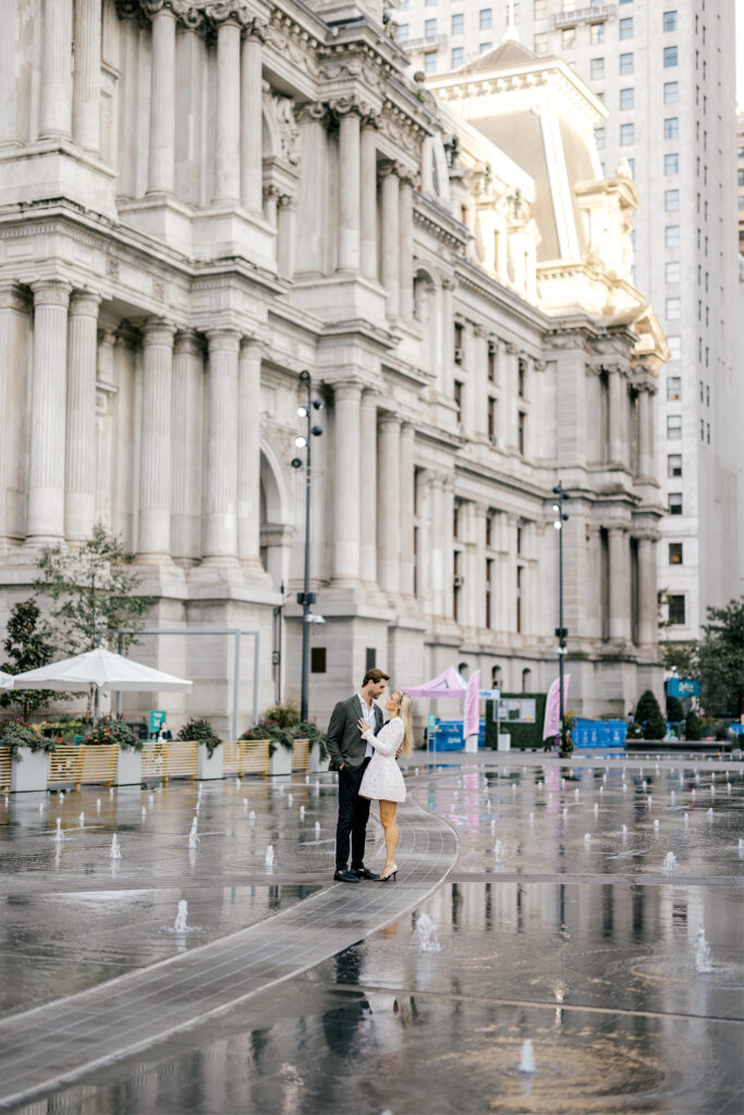 couples photoshoot at Philadelphia's City Hall for luxurious engagement photos