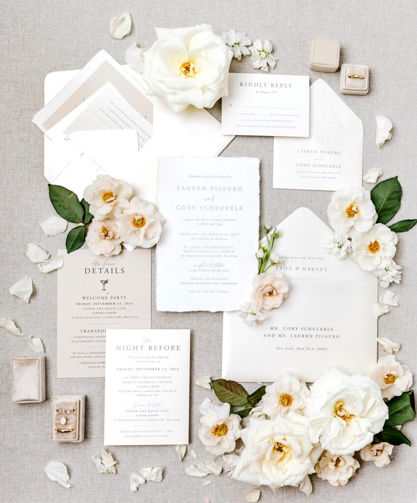 All white wedding invitational suite by Emily Wren Photography