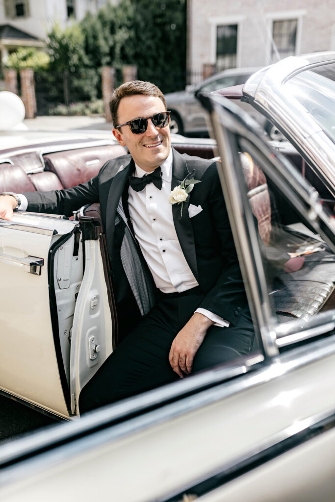 portrait of groom in vintage car by Pennsylvania wedding photographer Emily Wren Photography