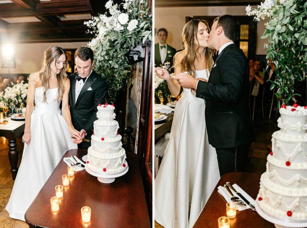 bride & groom cutting their four tier wedding cake