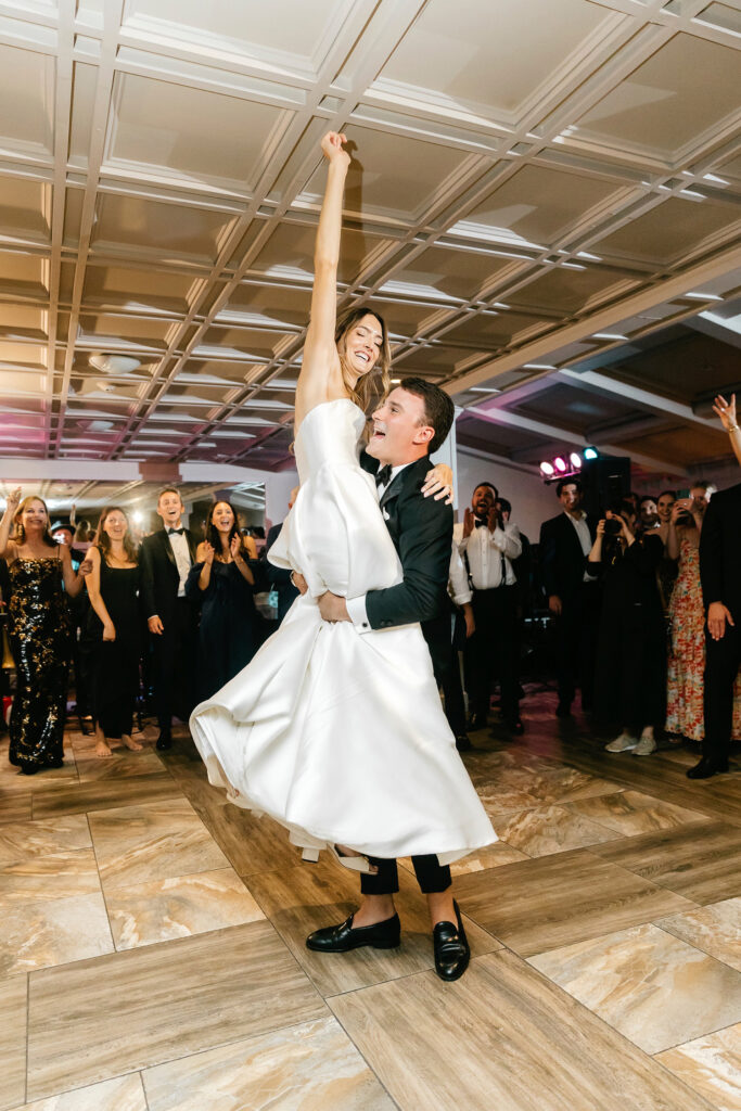 bride & groom fun first dance at New Hope wedding reception at the Hotel Du Village by Emily Wren Photography