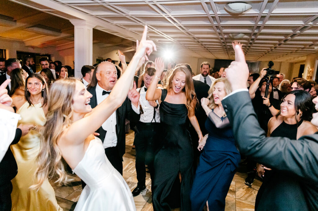 guests dancing and having un at Hotel Du Village wedding reception