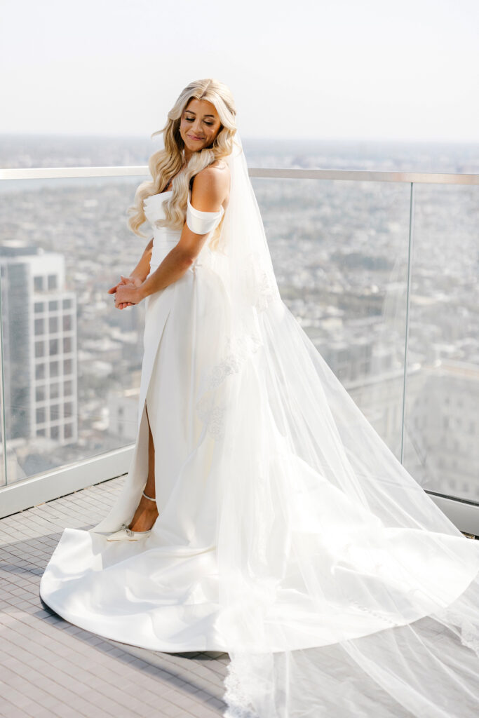 Portrait of Philadelphia bride on The W Hotel rooftop balcony by Emily Wren Photography