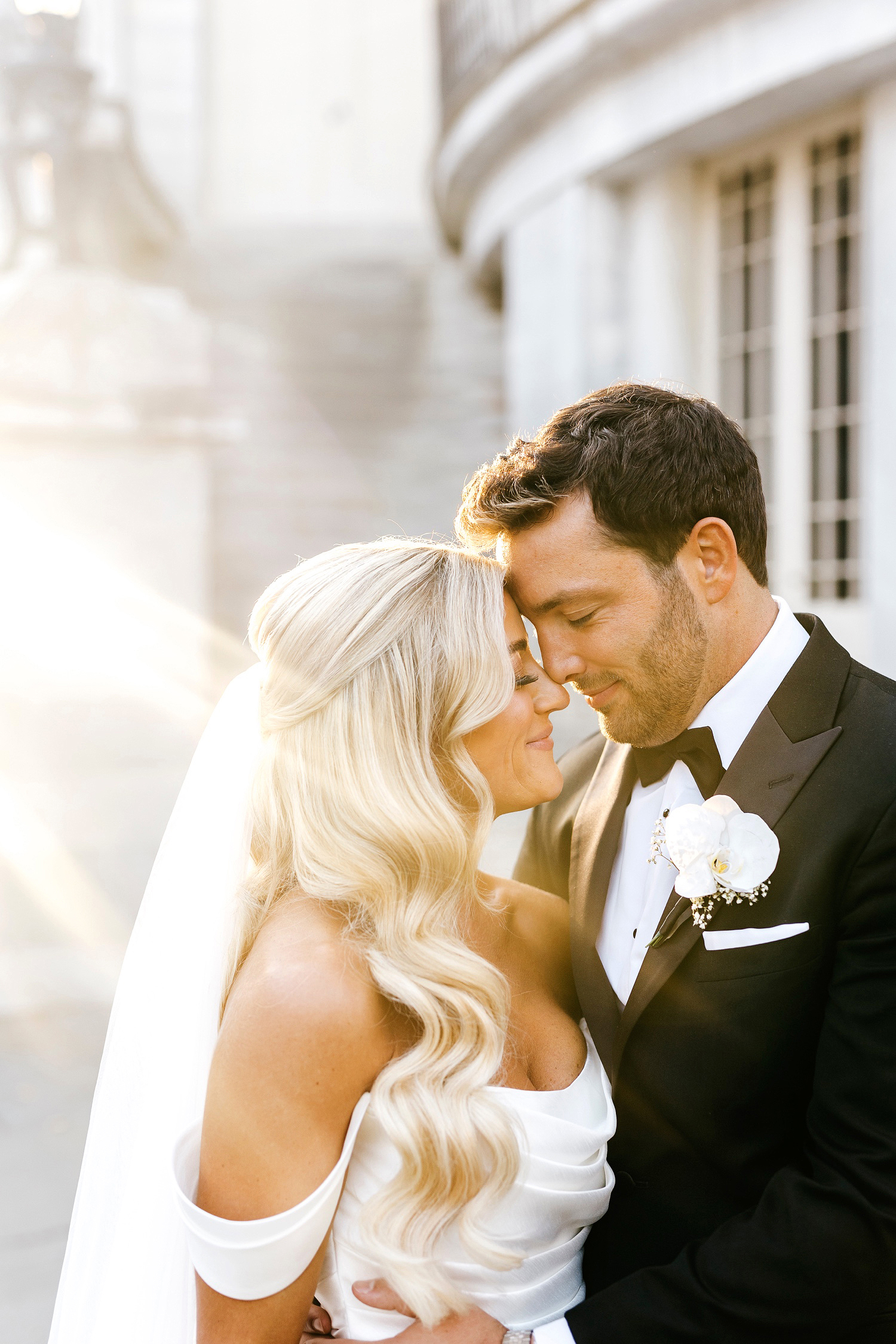 golden hour wedding portrait of bride & groom at Merchant's Exchange