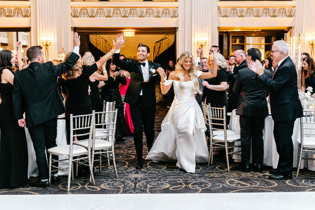 bride and groom entering their Ballroom at the Ben wedding reception