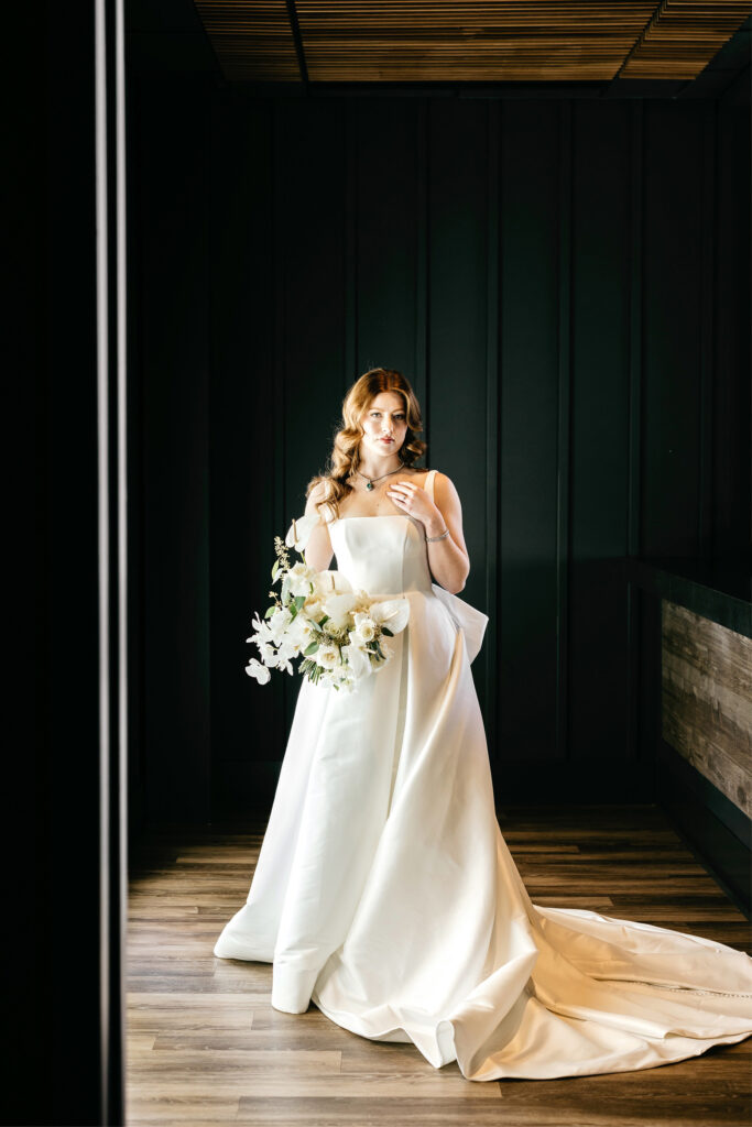 stunning bride in a minimalist and classic Van Cleve bridal gown by Emily Wren Photography