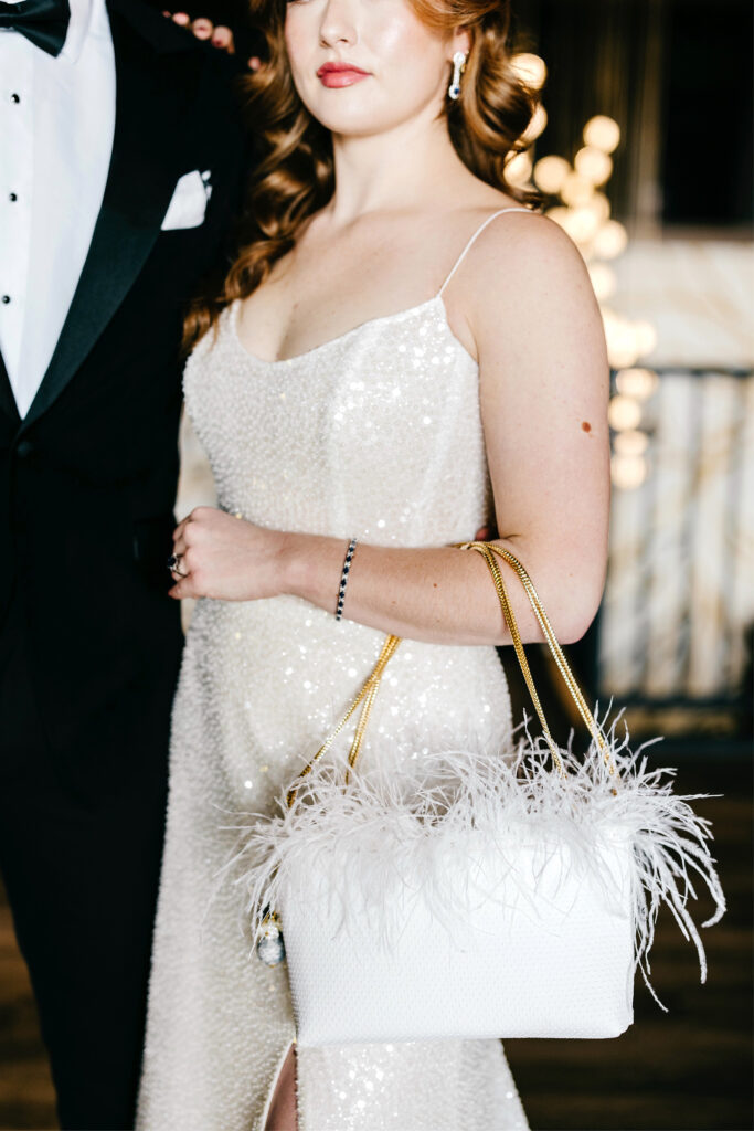 bridal purse with fringe and gold straps by Emily Wren Photography