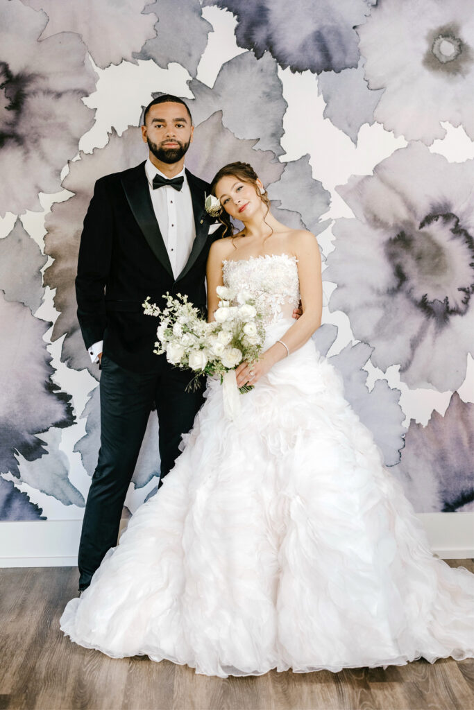 whimsical bride and groom, dressed in Van Cleve, at The Ivy at Ellis Preserve by Emily Wren Photography