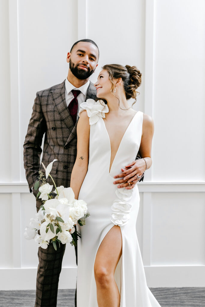 bride & groom dressed in Van Cleve by Emily Wren Photography