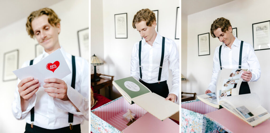 groom opening handmade photo album from the bride