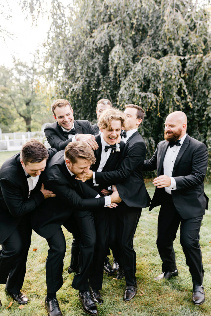 funny groomsmen photo by Pennsylvania wedding photographer Emily Wren Photography