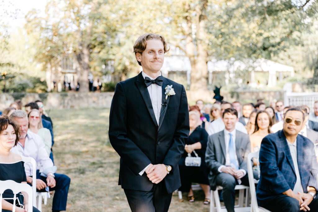 groom walking down the aisle at The Inn at Barley Sheaf