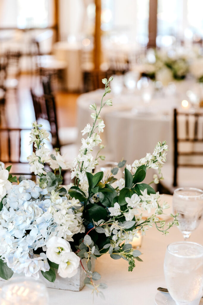 white and bleu wedding reception table decor by Emily Wren Photography