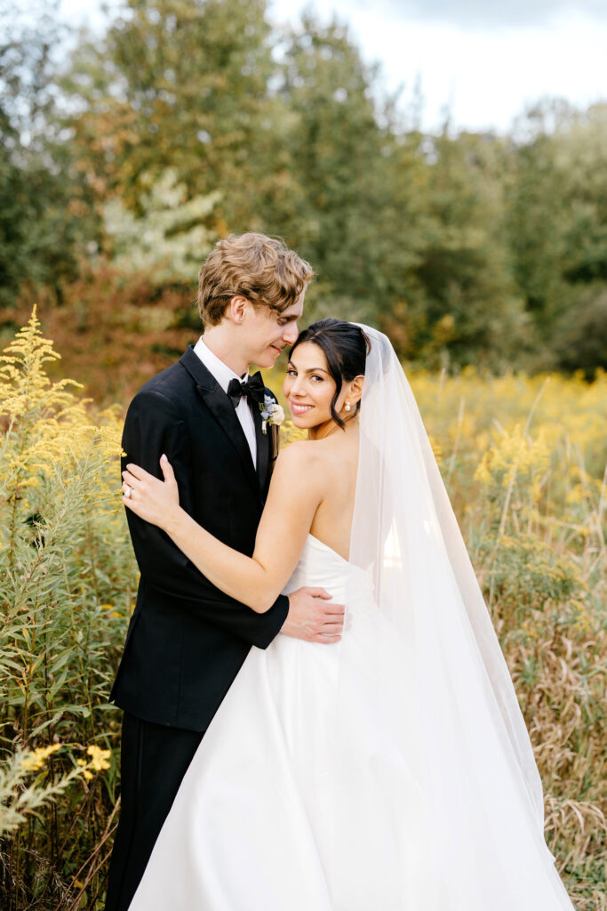 bride & groom portrait in Pennsylvania field at The Inn at Barley Sheaf