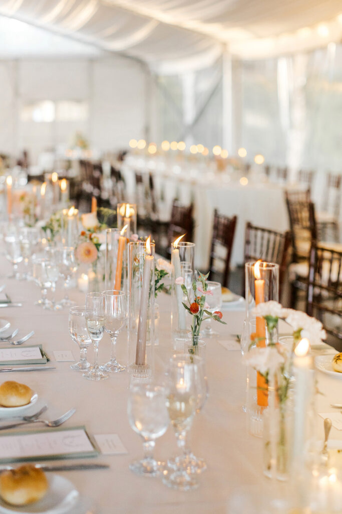 floral and candle wedding reception tablescapes designed by Courtney Space Events photographed by Emily Wren Photography