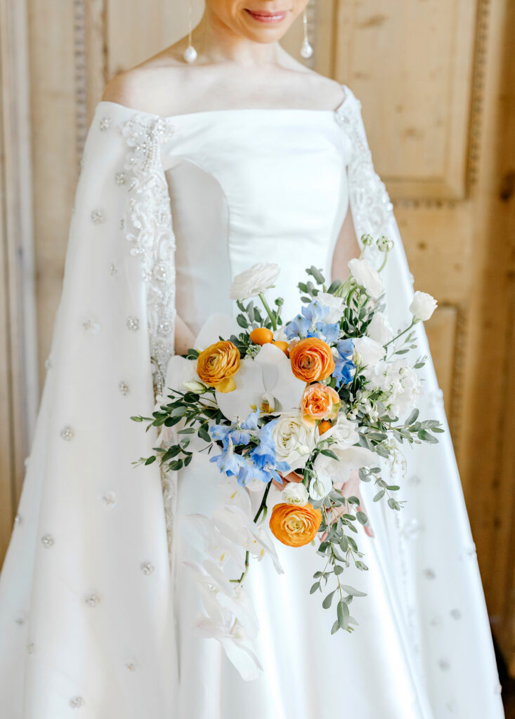 blue, white and orange floral fall bridal bouquet