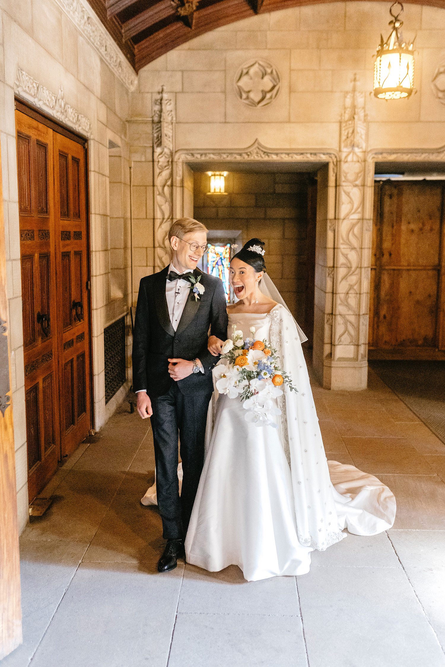 bride and groom before they walk down the aisle